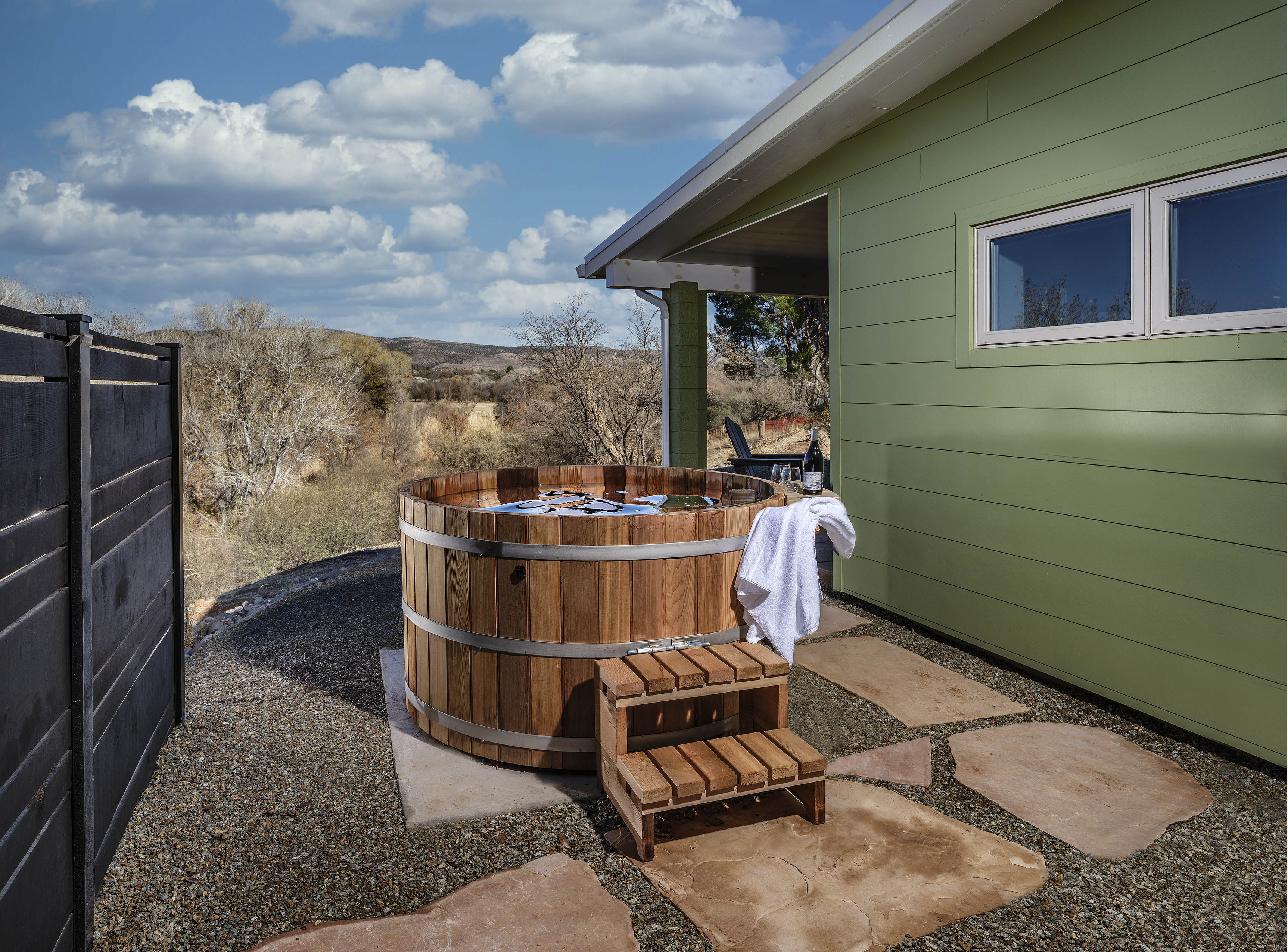 Cedar barrel hot tub on private deck overlooking the valley