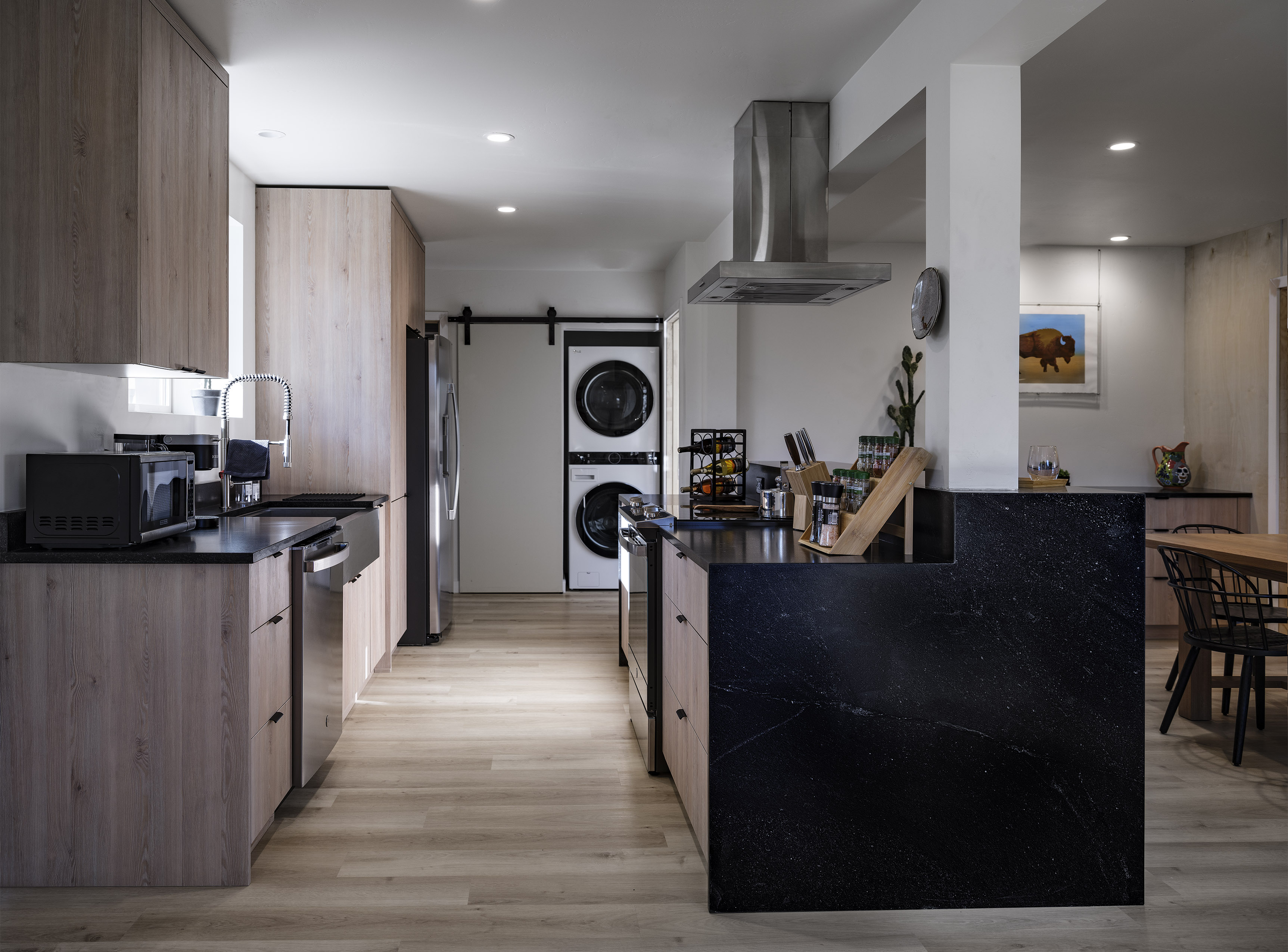 Modern kitchen with all the amenities viewed from the library