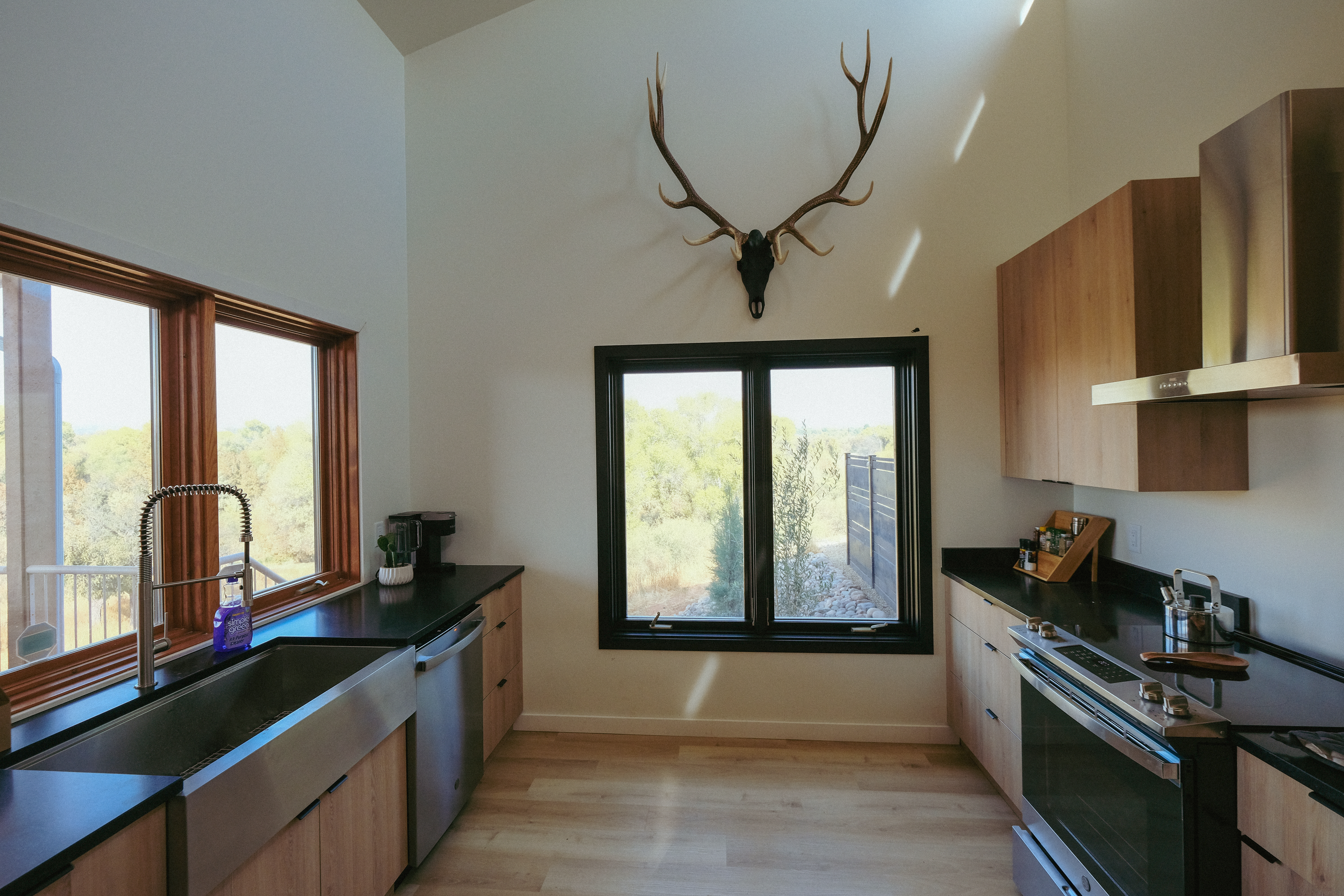 Gourmet kitchen with elk antler chandelier